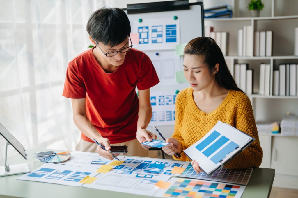 Asian businessman and woman people meeting in office. Employee brainstorm and work as team, plan